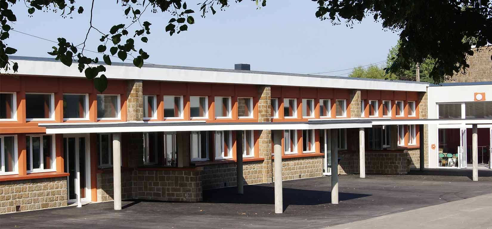 Maison des solidarités Vire Normandie bâtiment de l'ancienne école Paul Nicole